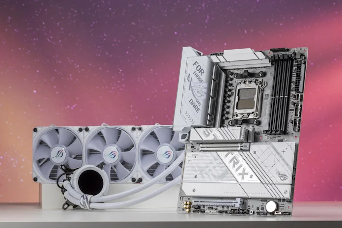 The ProArt X870-A Gaming WiFi motherboard next to an ROG Strix AIO cooler